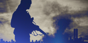 Silhouette of a person holding a weapon with a city skyline in the background, representing online terrorism